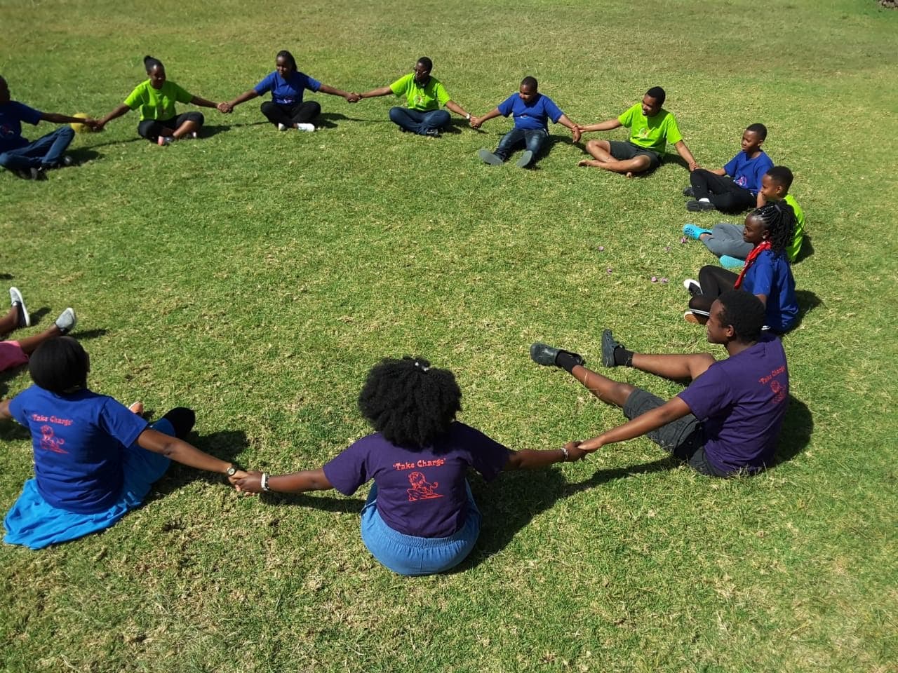 TYC members standing together