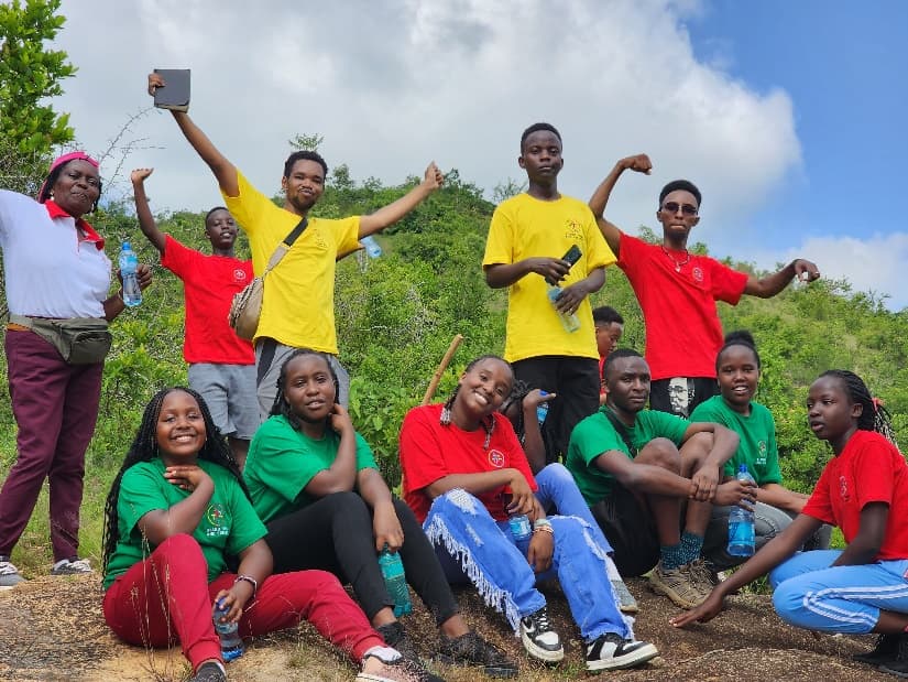 TYC members standing together